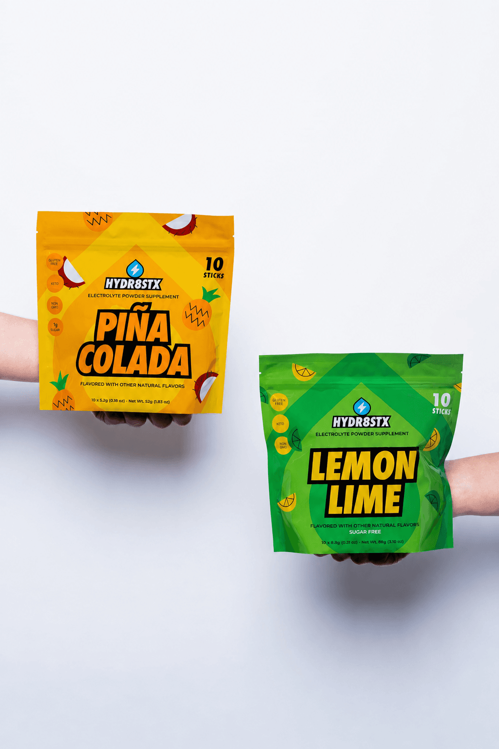 Hydr8Stx Lemon Lime and Piña Colada pouches held together